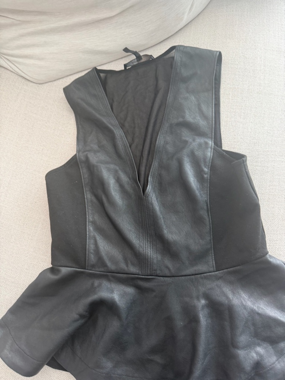 BCBGMaxAzria Black Faux Leather Peplum Top with Deep V